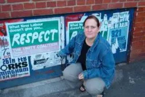 Debbie inspects illegal flyposting by the Respect Party